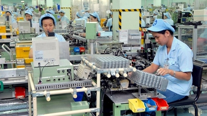 The electronic motor production line of the Japanese-funded Mabuchi Motor Vietnam in southern Dong Nai province's Bien Hoa 2 Industrial Zone. (Credit: VNA)