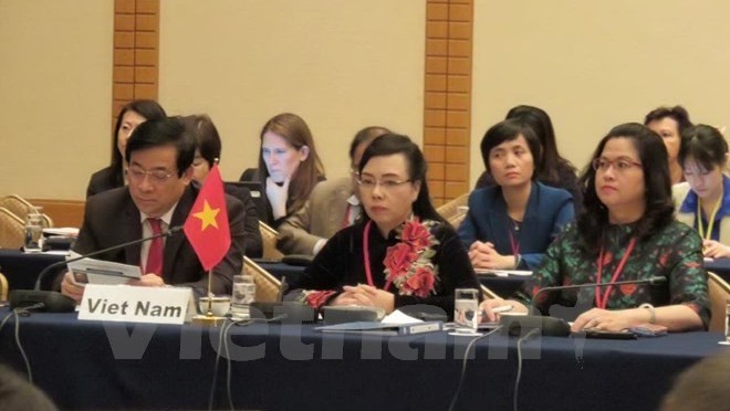 Health Minister Nguyen Thi Kim Tien (C) at the Meeting (Source: VNA)