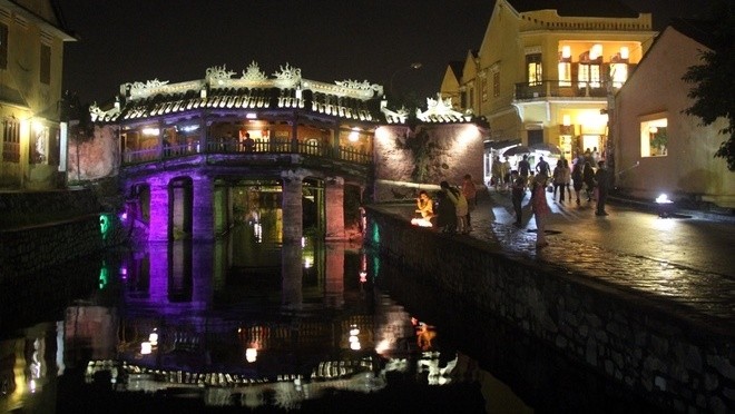 Sparkling Bridge pagoda in Hoi An, Quang Nam province by night 