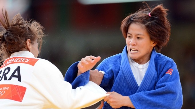 Judo queen Van Ngoc Tu (right) has won an Olympic slot for the second consecutive time. 