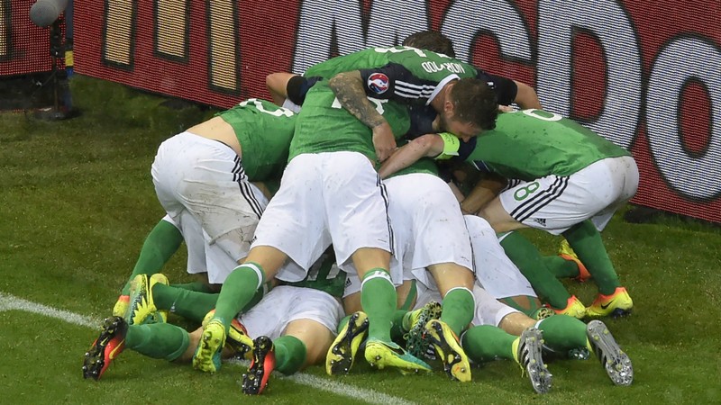 Northern Ireland players celebrate a goal against Ukraine on June 17. (Photo: Goal)