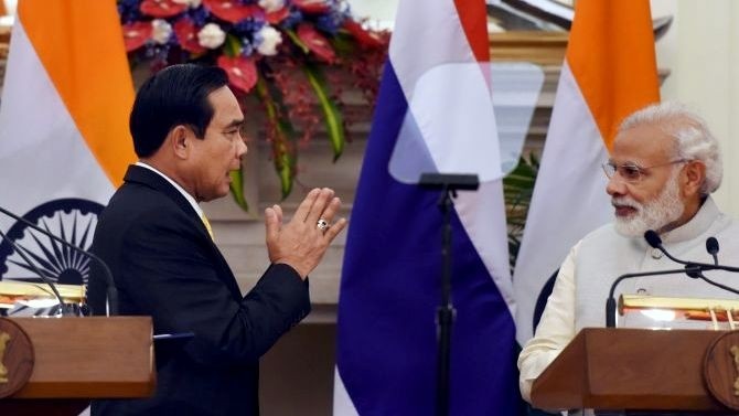 Indian PM Narendra Modi with his Thai counterpart General Prayut Chan-o-cha after a joint press statement in New Delhi on June 17. (Credit: Press Trust of India)