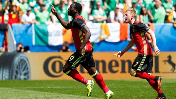 Lukaku (left) celebrates his opener for Belgium.