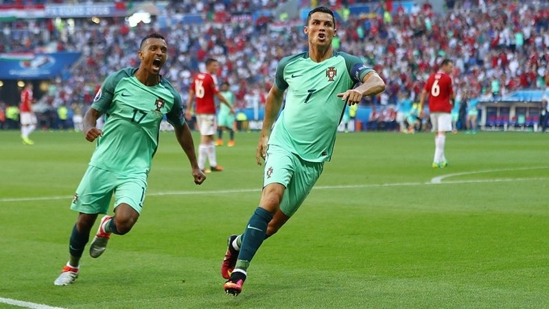 Cristiano Ronaldo scores twice in Portugal's 3-3 draw against Hungary early on June 23. (Photo: UEFA)