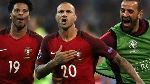 Quaresma (centre) converts the last penalty kick to seal a 5-3 victory for Portugal. (Photo: Getty)