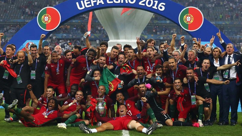 The Portuguese celebrate in joy after edging past France to claim the Euro cup.