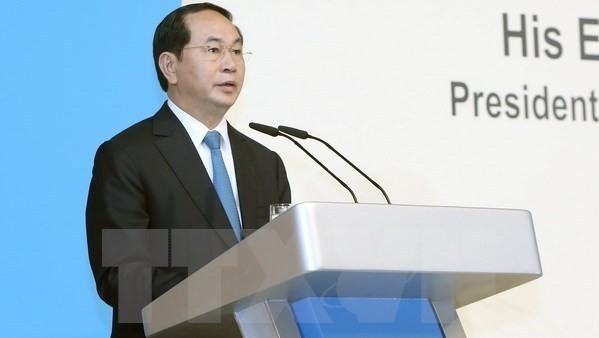 President Tran Dai Quang speaking at the Singapore-Vietnam business forum (Credit: VNA)