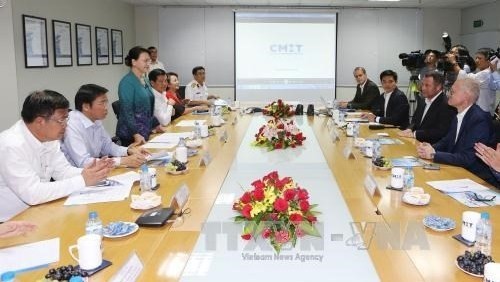 National Assembly Chairwoman Nguyen Thi Kim Ngan speaks with officials at the Cai Mep Thi Vai port complex. (Credit: VNA)