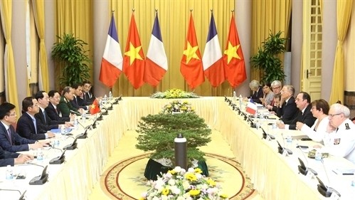 The talks between the Vietnamese and French Presidents in the morning of September 6 (Photo: VNA)