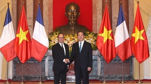 Presidents Tran Dai Quang and Francois Hollande (Photo: VNA) 