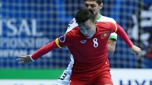 Minh Tri (red) contributes three to Vietnam’s four-goal tally against Guatemala.