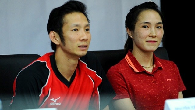 Two top Vietnamese badminton players, Nguyen Tien Minh (L) and Vu Thi Trang (R), are participating in the tournament.