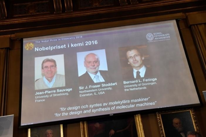 Pictures of the winners of the 2016 Nobel Chemistry Prize are displayed on a screen during a news conference by the Royal Swedish Academy of Sciences in Stockholm, Sweden October 5, 2016. Photo: Reuters