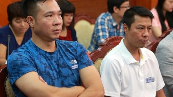 Vietnam’s 2016 Olympians, Hoang Xuan Vinh and Tran Quoc Cuong at the press briefing on October 27.