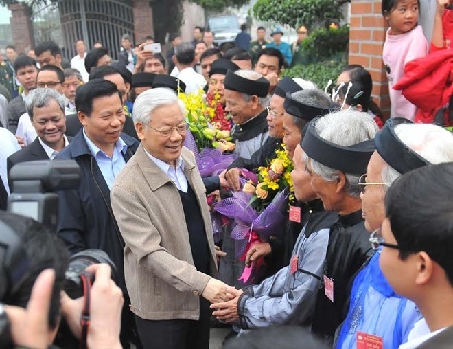 Party General Secretary Nguyen Phu Trong attends the great national unity festival in Phat Tich commune. 