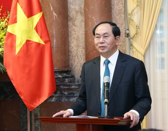 President Tran Dai Quang speaks at the meeting. (Credit: VNA)