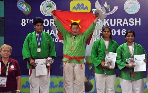 Vietnam’s Tran Thi Thanh Thuy wins the women’s over-78kg category.