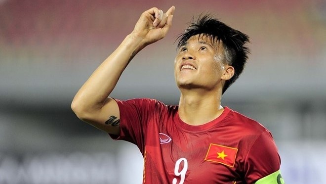 Vietnamese striker Le Cong Vinh reacts after scoring a goal in the match against Cambodia.
