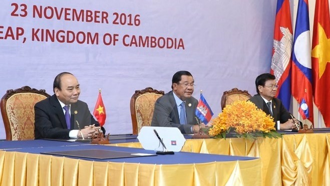 The prime ministers of Vietnam, Cambodia and Laos
