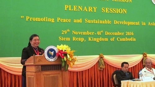 NA Vice Chairwoman Tong Thi Phong delivers her speech at the 9th APA Plenum in Cambodia on November 29. (Credit: VNA)