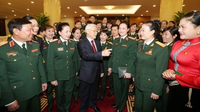 Party General Secretary Nguyen Phu Trong meets with outstanding female representatives working in the armed forces in Hanoi on December 7. (Credit: VNA)