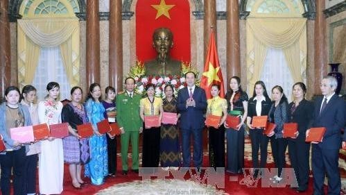 President Tran Dai Quang and delegates at the meeting (Photo: VNA)