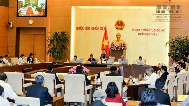 The 14th NASC holds its first-ever Q&A session for the two ministers of Labour, Invalids and Social Affairs, and Information and Communications, at the ongoing ninth sitting on April 18. (Credit: quochoi.vn)