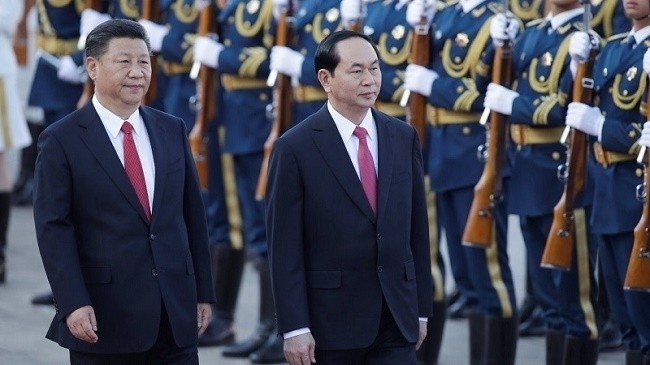 President Tran Dai Quang (R) and Chinese President Xi Jinping (Photo: VNA)