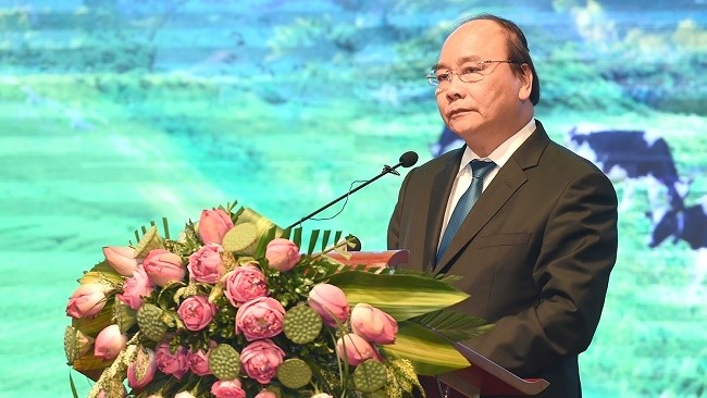 Prime Minister Nguyen Xuan Phuc speaks at the conference. (Photo: VGP)