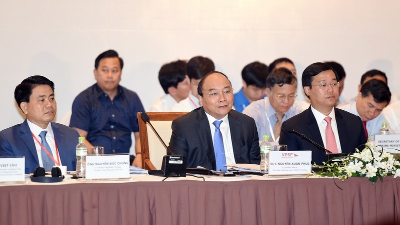 PM Nguyen Xuan Phuc attends the second Vietnam Private Sector Forum. (Credit: VGP)