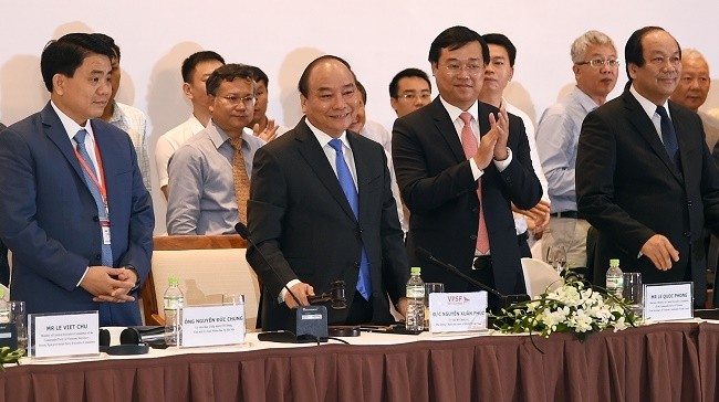 Prime Minister Nguyen Xuan Phuc attends the second Vietnam Private Sector Forum. 