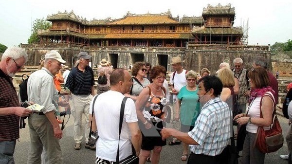 Foreigners visit the former imperial capital city of Hue (Illustrative image. Source: VNA)