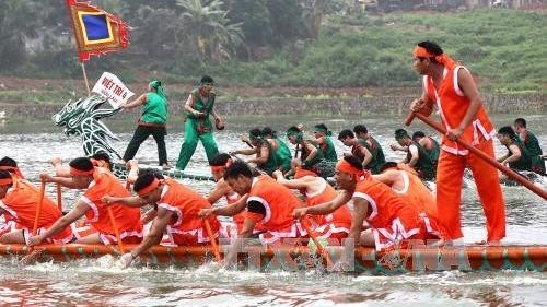 A traditional boat race of Phu Tho province will feature for the first time at the village as part of the programme (Photo: VNA)