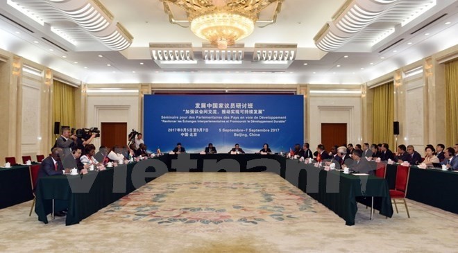 At the “Parliamentary Capacity Building and the Further Implementation of the Sustainable Development Goals” seminar in Beijing, China. (Photo: VNA)