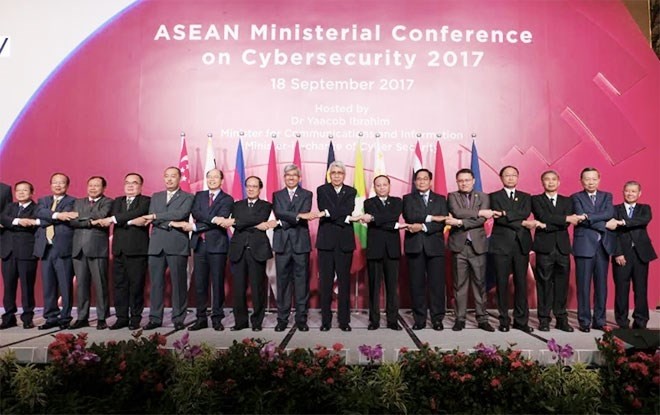 Minister of Public Security To Lam takes a group photo with other delegates at the conference (Photo:cand.com.vn)