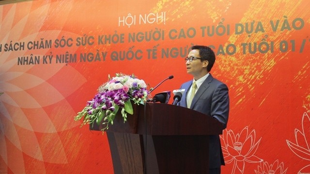 Deputy PM Vu Duc Dam speaks at the conference. (Credit: suckhoedoisong.vn)