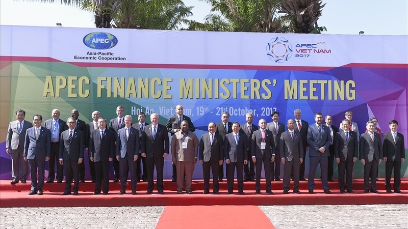 Finance Ministers of the economies of Asia-Pacific Economic Cooperation pose for a photo