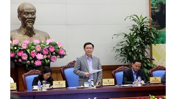 Deputy PM Vuong Dinh Hue speaks at the teleconference. (Credit: VGP)