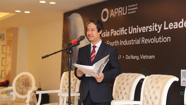 President of the Vietnam National University-Hanoi, Nguyen Kim Son, speaks at the forum.