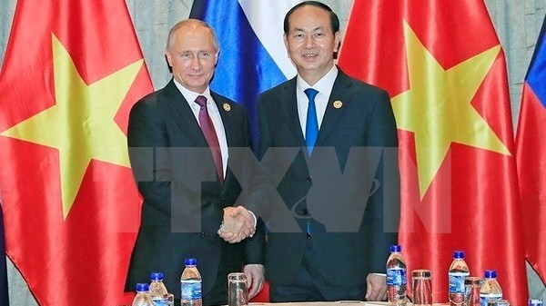 Vietnamese President Tran Dai Quang (R) and Russian President Vladimir Putin (Source: VNA)