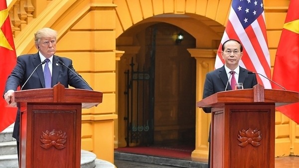 President Tran Dai Quang and US President Donald Trump chair a joint press conference following their talks in Hanoi on November 12.