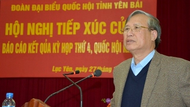 Head of the Party Central Committee's Inspection Commission Tran Quoc Vuong speaks at the meeting with Yen Bai voters, Luc Yen district, the northern province of Yen Bai, on November 27. (Credit: NDO)