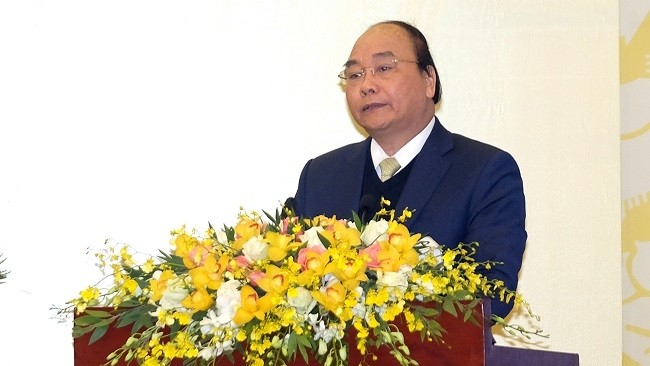 PM Nguyen Xuan Phuc speaks at the conference. (Photo: VGP)