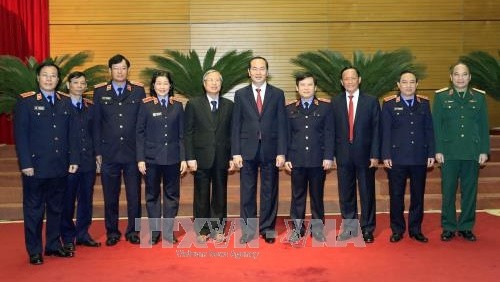 President Tran Dai Quang (sixth from left) and delegates at the meeting (Photo: VNA)