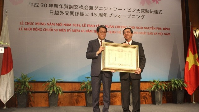 Vietnam’s former ambassador Nguyen Phu Binh (R) honoured with Japanese order