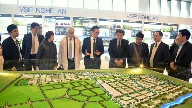 Representatives from Mitsubishi Motors join a field trip in the search for the location of its second factory in Vietnam, at the VSIP Industrial Park in the central province of Nghe An, January 10. (Credit: baonghean.vn)