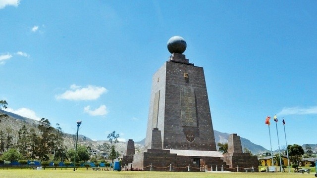 Monument to the Equator at Mitad del Mundo complex which marks the passage of the equator through Ecuador.