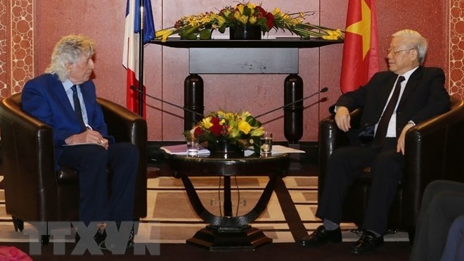 Party General Secretary Nguyen Phu Trong (right) and AAFV President Gérard Daviot. (Photo: VNA)