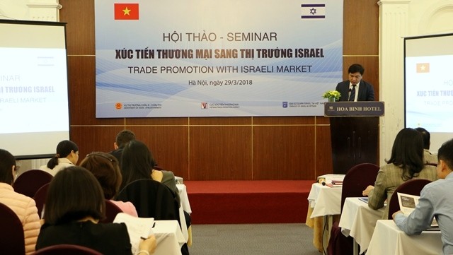 The seminar provides Vietnamese firms with the latest information on trade development opportunities in Israel. (Photo: qdnd.vn)