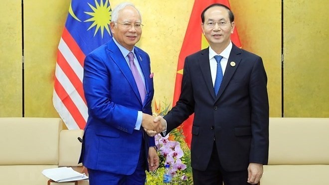 President Tran Dai Quang (R) and Malaysian Prime Minister Najib Tun Razak at a meeting in 2017 (Photo: VNA)